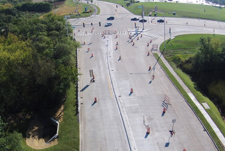 Central-Rd-ISTHA-DJI00619_web Aerial view of a construction site with traffic control barriers, indicating road improvements and ongoing municipal infrastructure work.